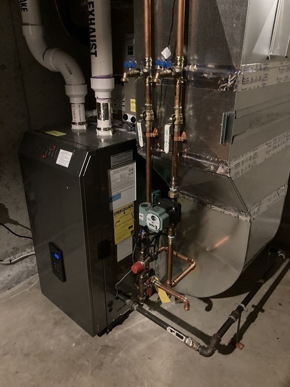 65 Purgatory Road Sutton, MA 01590 - Photo 36 of 40 a room with water heater and car parked
