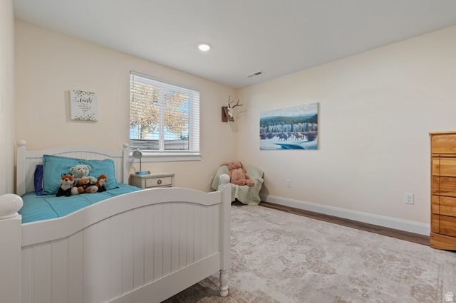 75 North 100th Street West Fillmore, UT 84631 - Photo 27 of 62 Bedroom featuring wood finished floors and recessed lighting
