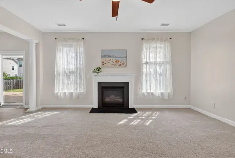a kitchen with stainless steel appliances granite countertop a stove a sink and a wooden floors