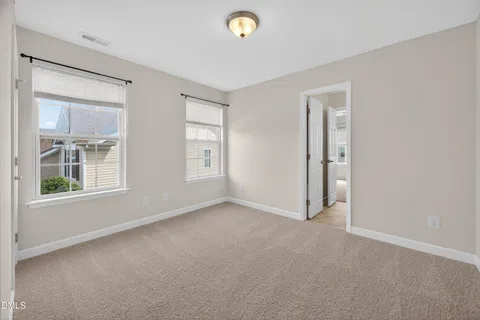 an empty room with a natural light