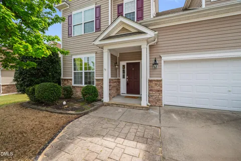 front view of a house with a street