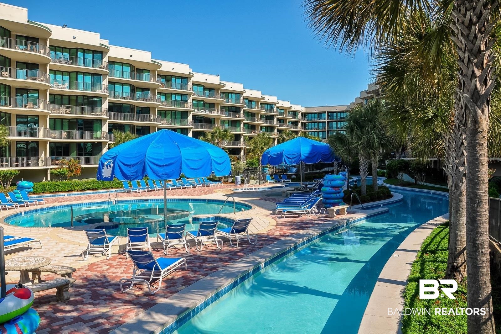 27580 Canal Road, Unit 1429 Orange Beach, AL 36561 - Photo 28 of 45 Community pool featuring area for grilling and a patio area