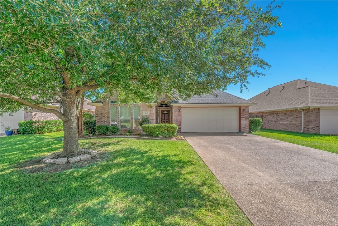 3743 Essen Loop College Station, TX 77845 - Photo 3 of 22 Double driveway leading to your 2-car garage.