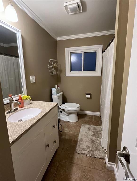 1341 Catalpa Drive Rochester, MI 48307 - Photo 5 of 9 Bathroom featuring a white vanity with a light-colored countertop, an oval undermount sink, and a single-handle faucet