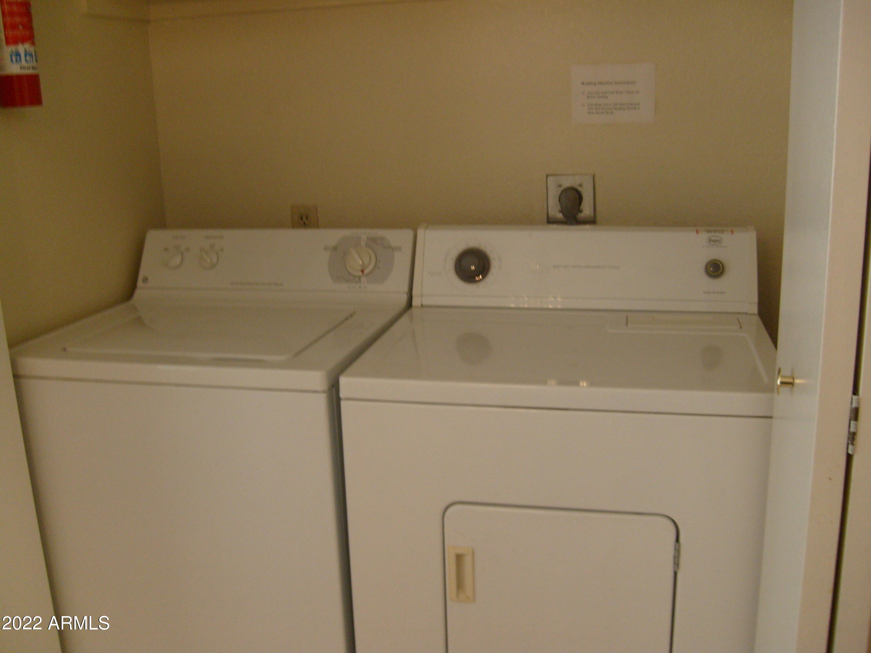 5236 West Peoria Avenue, Unit 115 Glendale, AZ 85302 - Photo 11 of 19 a utility room with dryer and washer