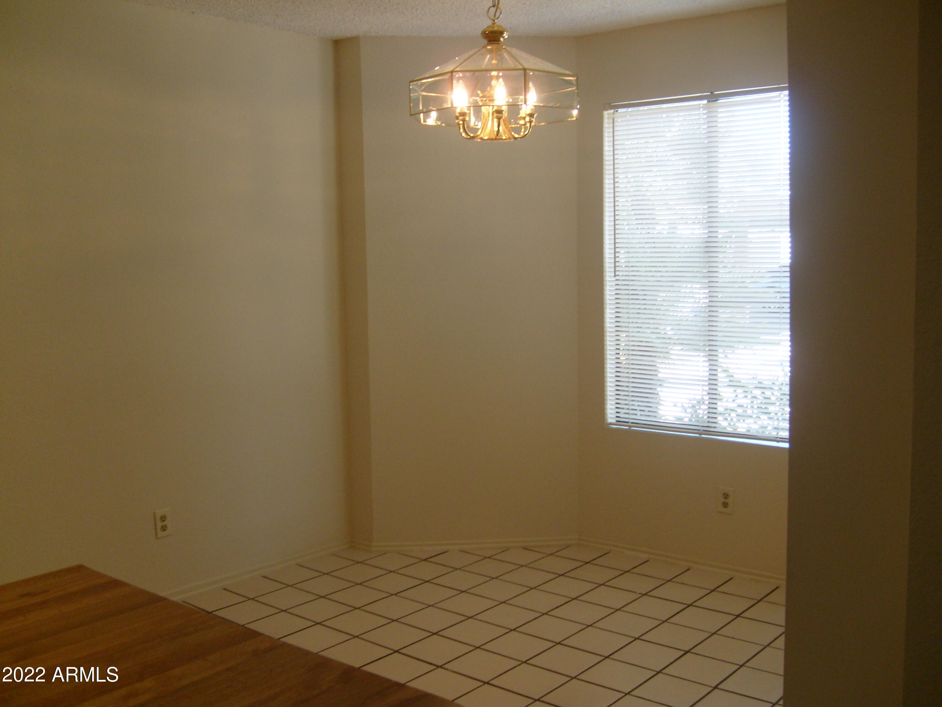 5236 West Peoria Avenue, Unit 115 Glendale, AZ 85302 - Photo 16 of 19 a view of empty room with window