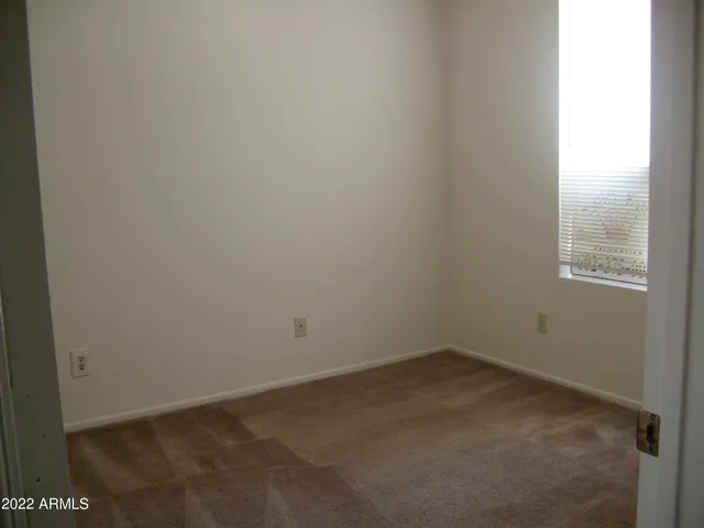 an empty room with closet