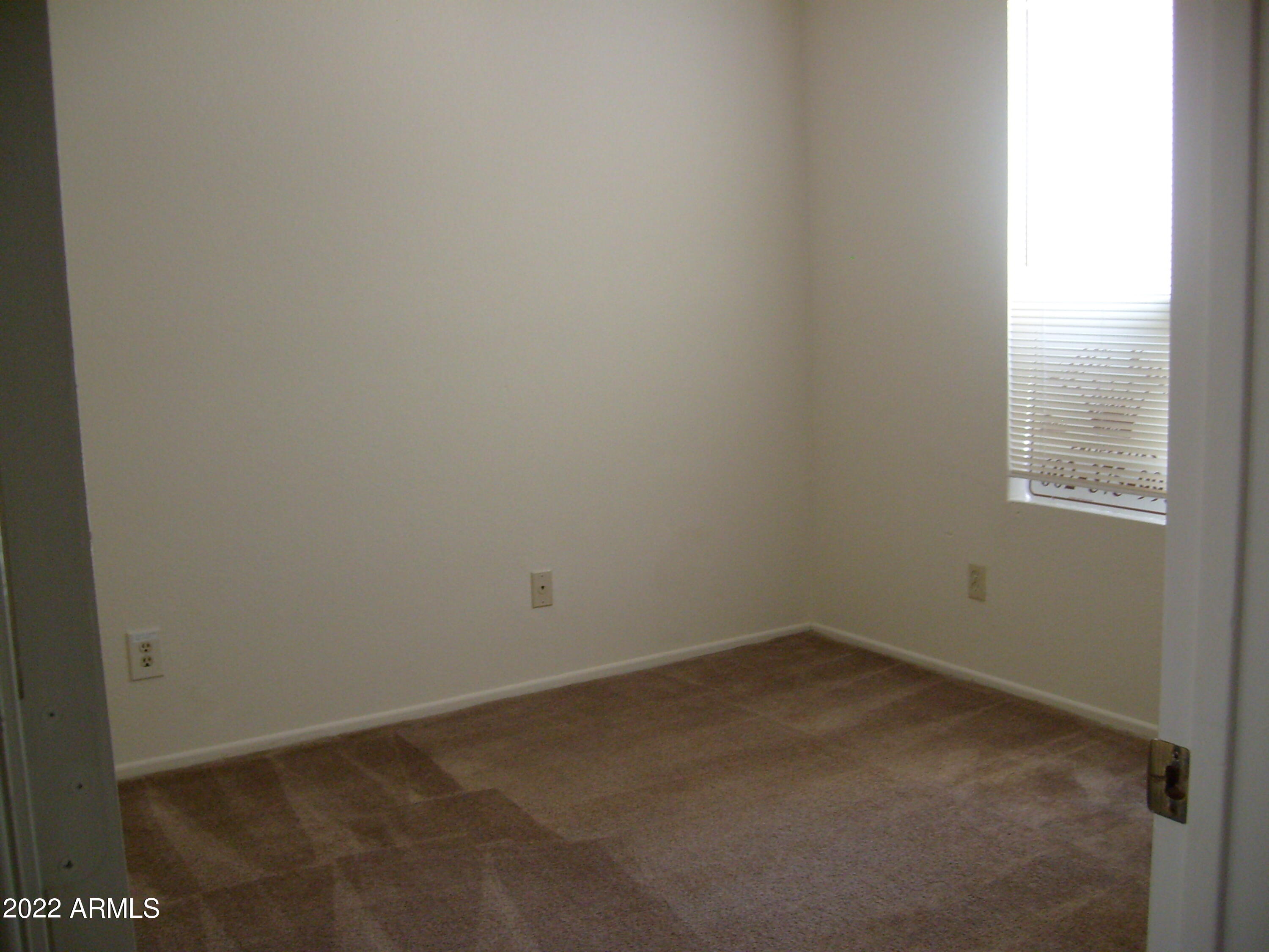 5236 West Peoria Avenue, Unit 115 Glendale, AZ 85302 - Photo 18 of 19 a view of an empty room