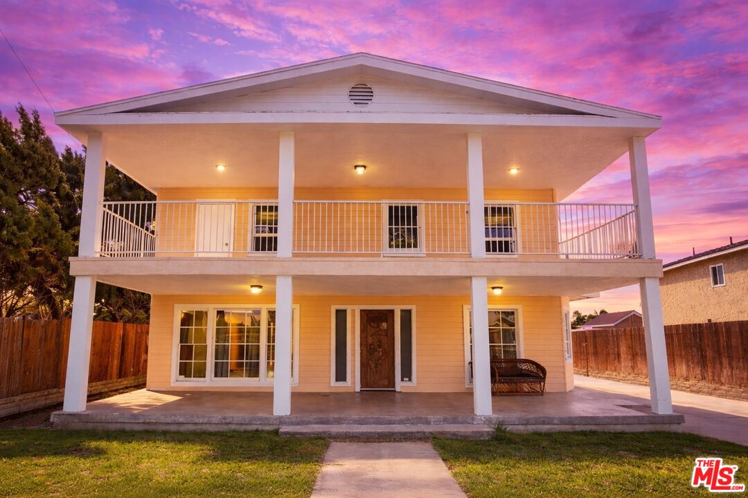 a view of a building with a swimming pool