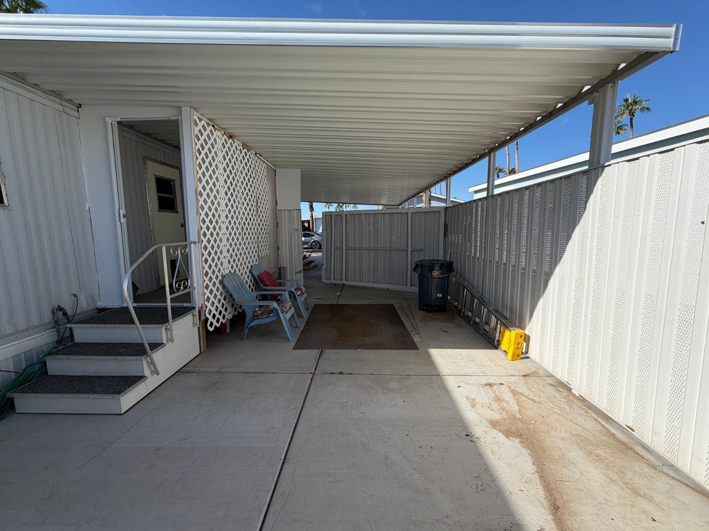 345 South 58th Street, Unit 82 Mesa, AZ 85206 - Photo 12 of 17 a view of a patio with table and chairs