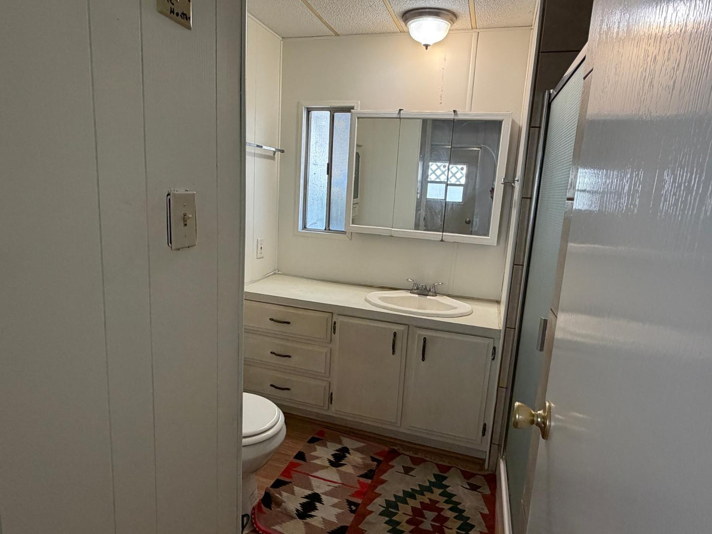 345 South 58th Street, Unit 82 Mesa, AZ 85206 - Photo 3 of 17 a bathroom with a sink toilet and shower