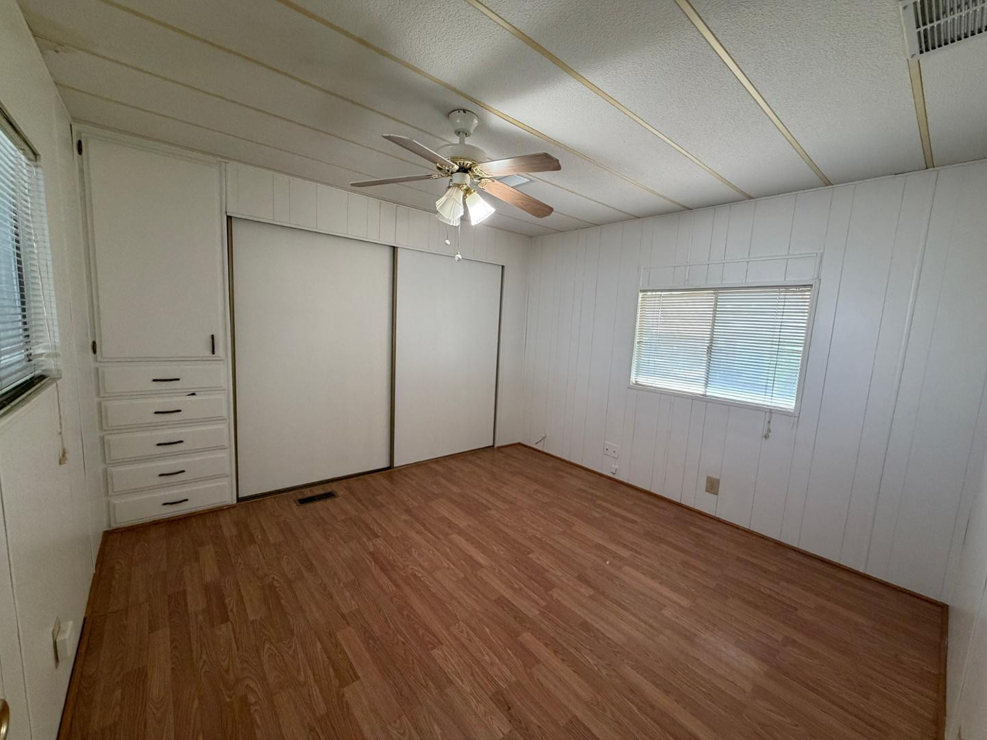 345 South 58th Street, Unit 82 Mesa, AZ 85206 - Photo 6 of 17 wooden floor in an empty room