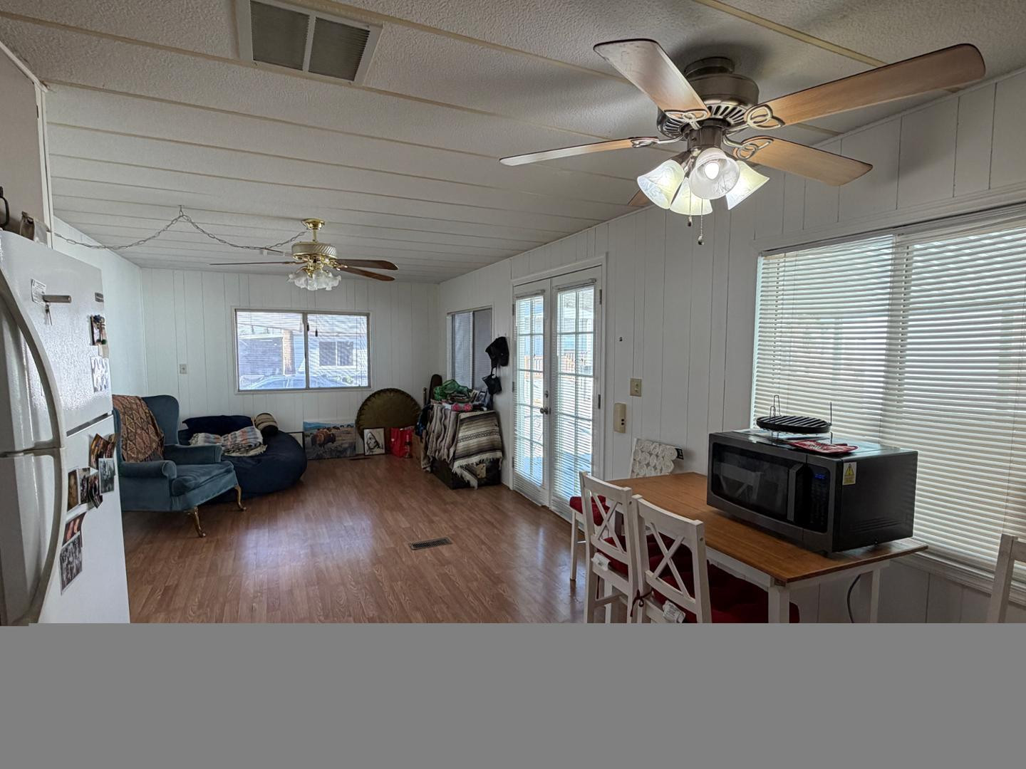 345 South 58th Street, Unit 82 Mesa, AZ 85206 - Photo 9 of 17 a living room with furniture and wooden floor