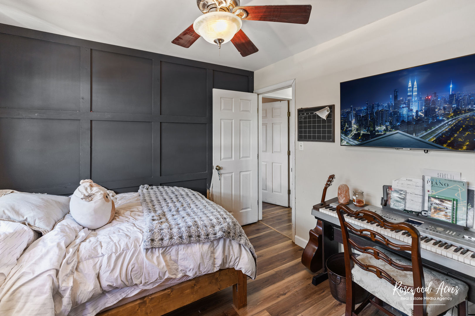 11016 Kimberly Trail Mokena, IL 60448 - Photo 17 of 22 a bedroom with a bed and a chandelier