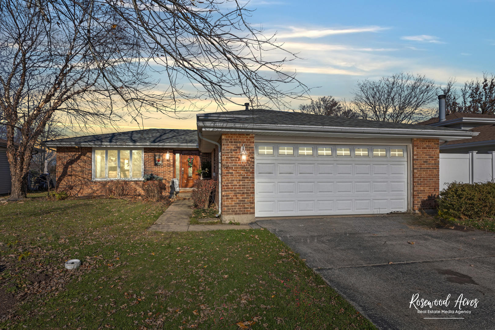 11016 Kimberly Trail Mokena, IL 60448 - Photo 3 of 22 a front view of a house with a yard and garage