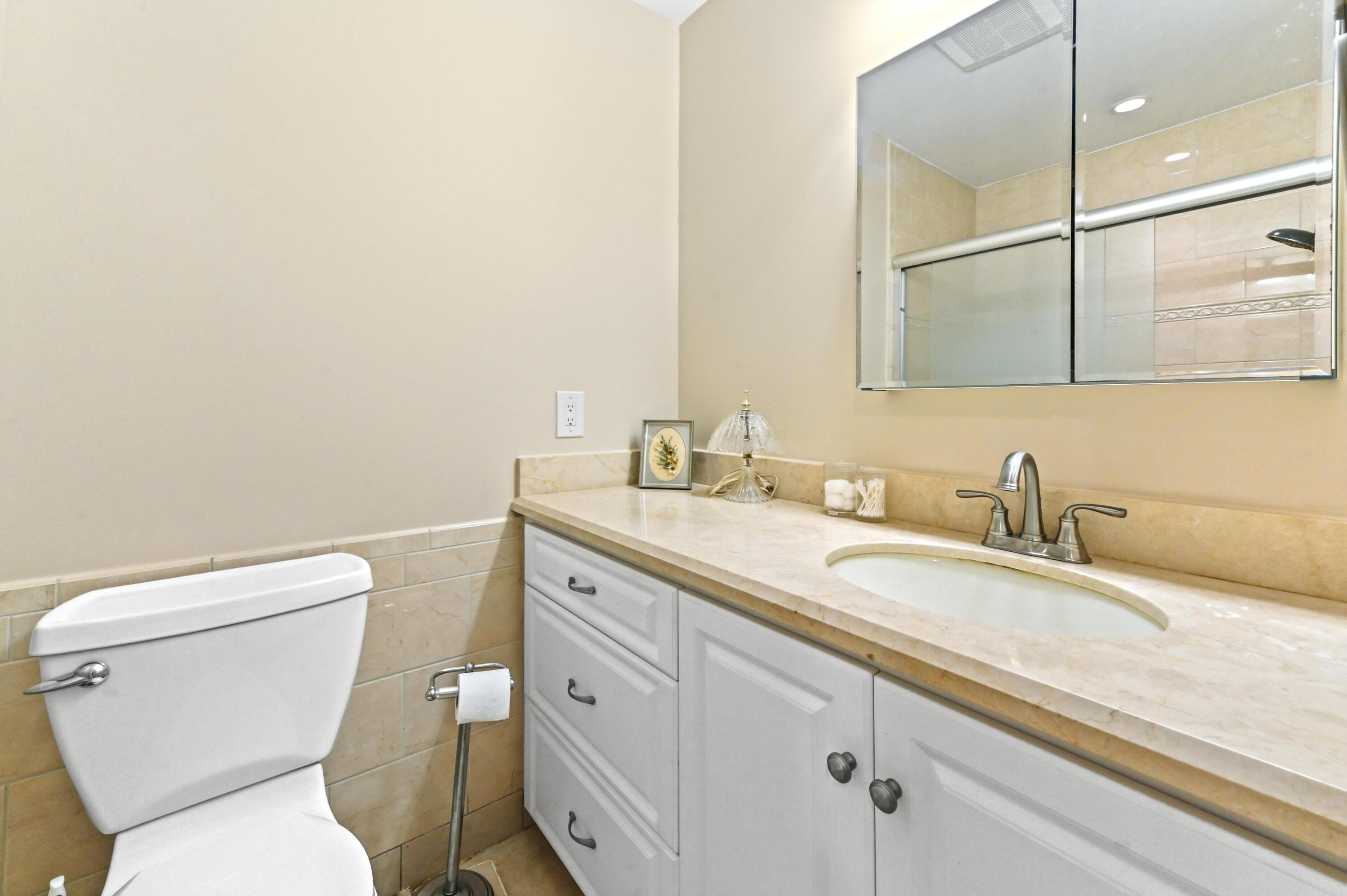 14080 Nesting Way, Unit A Delray Beach, FL 33484 - Photo 14 of 30 18 Bath room 02
