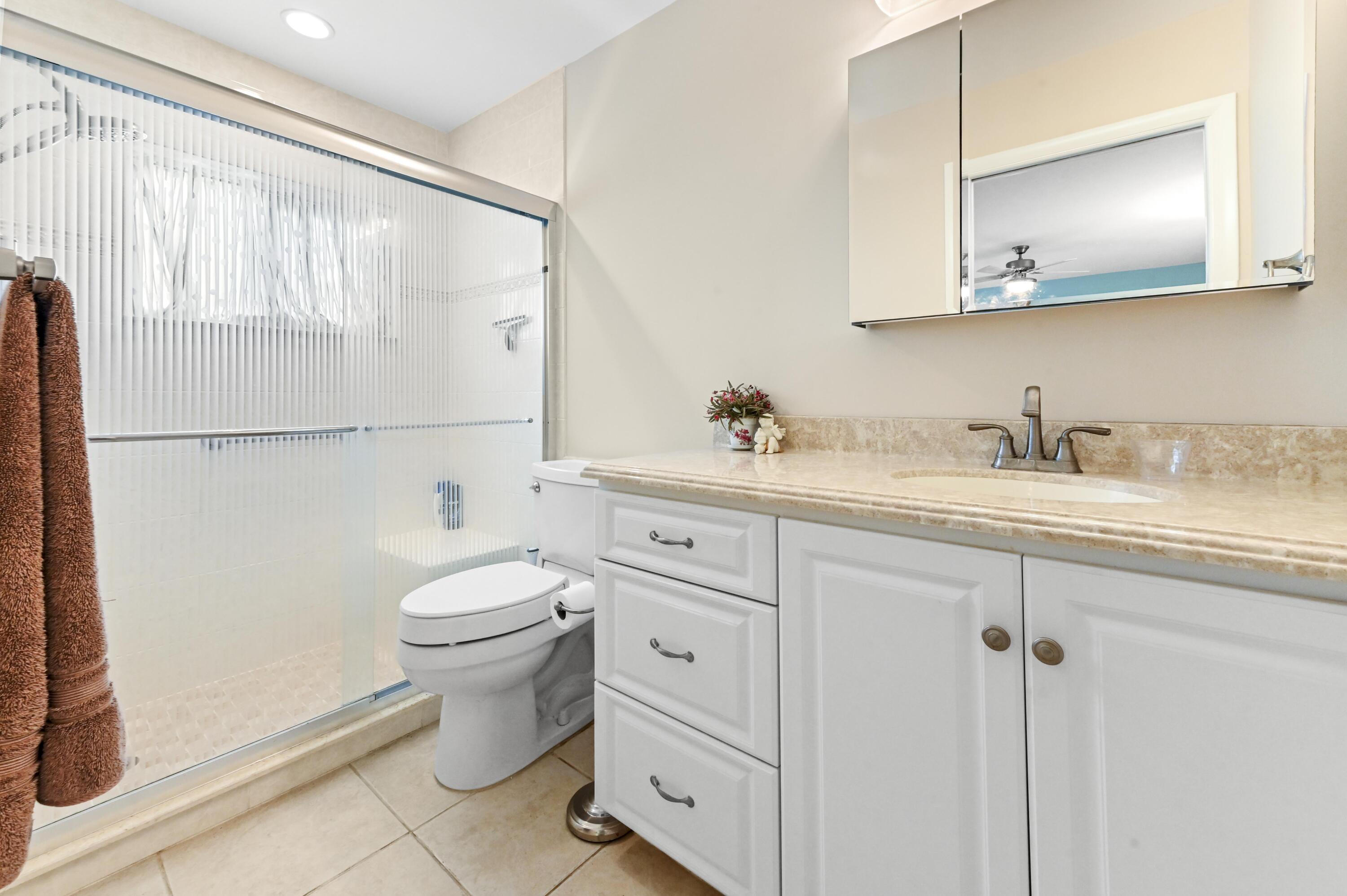 14080 Nesting Way, Unit A Delray Beach, FL 33484 - Photo 17 of 30 22 Bath room 01
