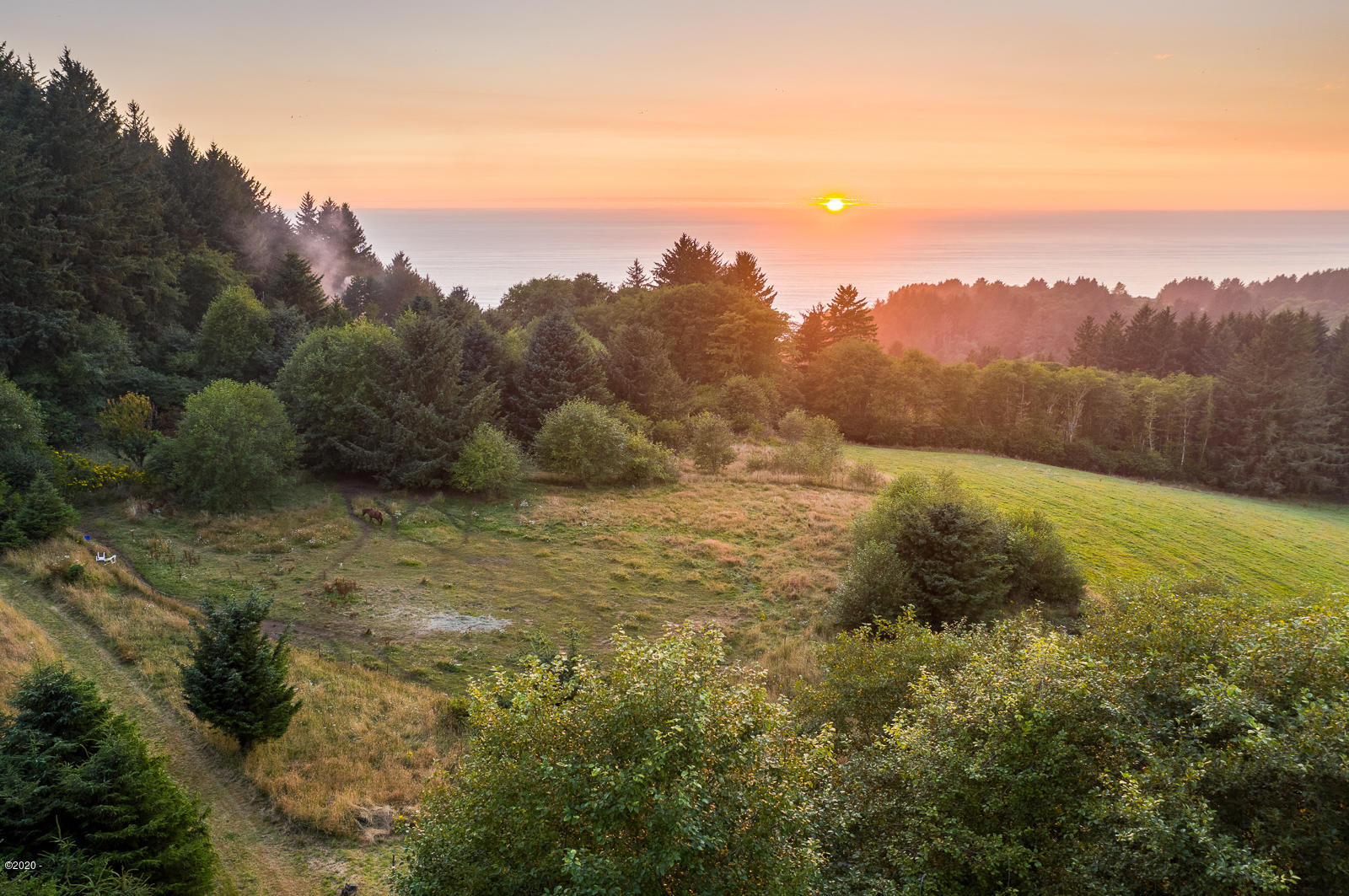 501 Rowan Road Neskowin, OR 97149 - Photo 1 of 21 Sunset Drone Shot