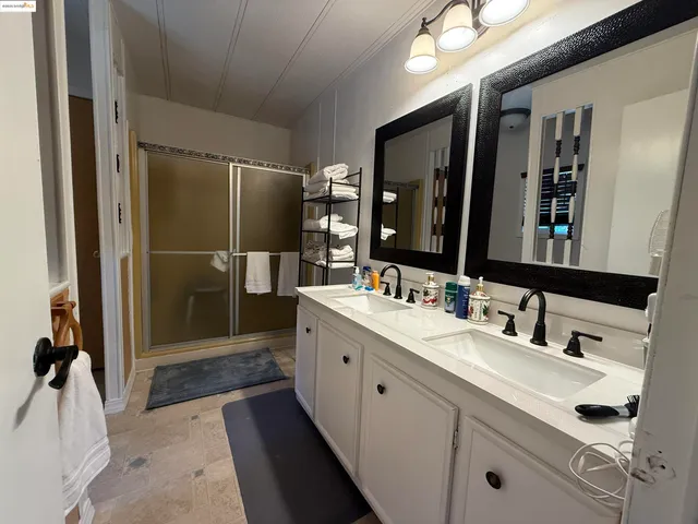 a bed room with a bed and a dresser