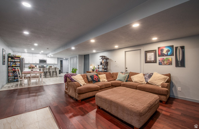 262 North Santa Fe Drive Mapleton, UT 84664 - Photo 20 of 28 Living area featuring dark wood-type flooring and recessed lighting