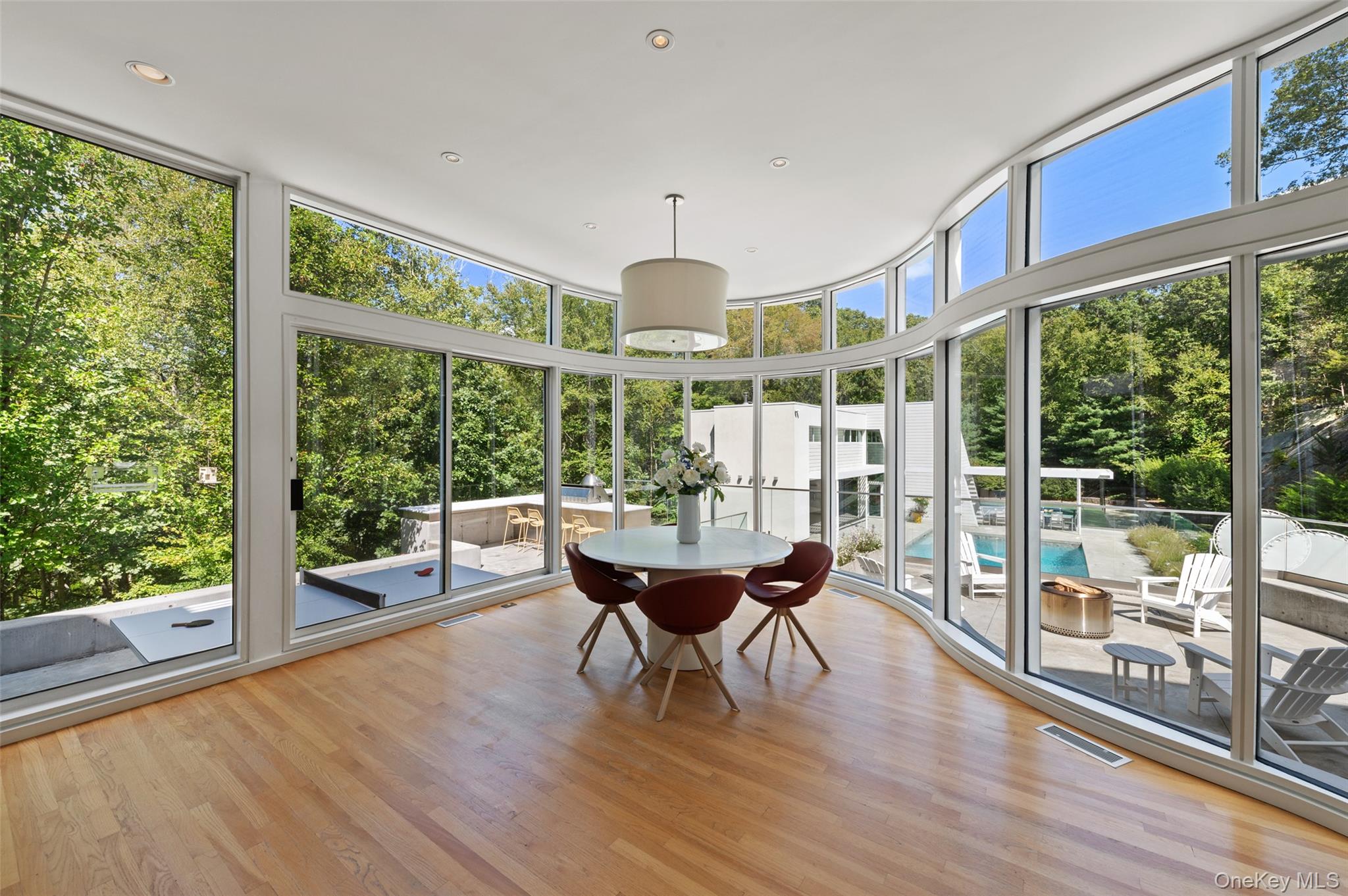 25 Col Sheldon Lane Pound Ridge, NY 10576 - Photo 13 of 34 a living room with furniture and a large window