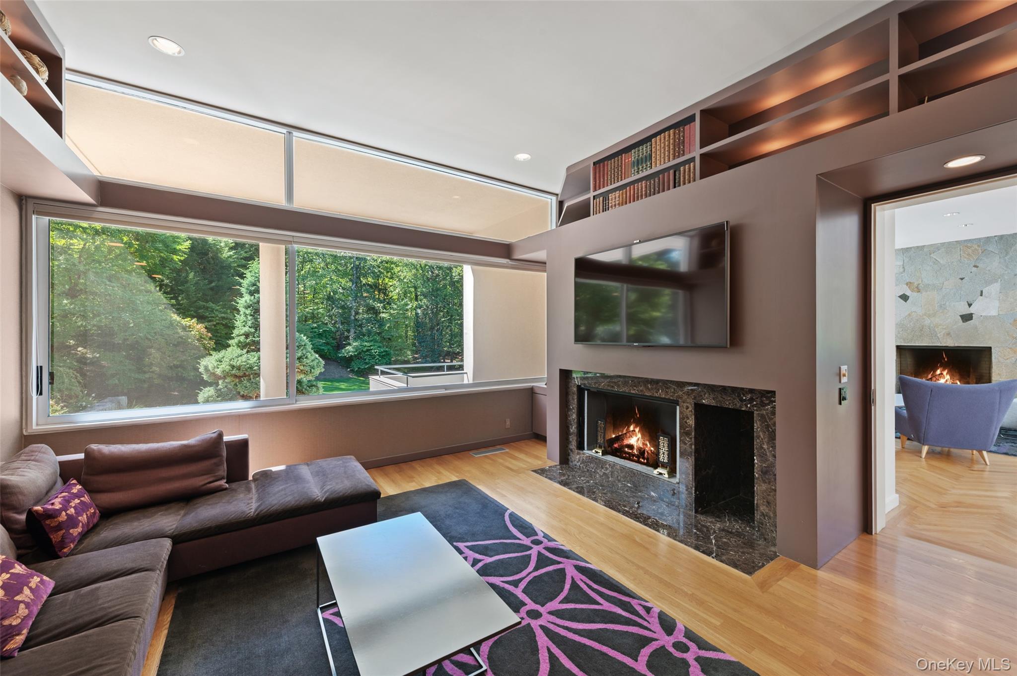 25 Col Sheldon Lane Pound Ridge, NY 10576 - Photo 15 of 34 a living room with furniture and a fireplace