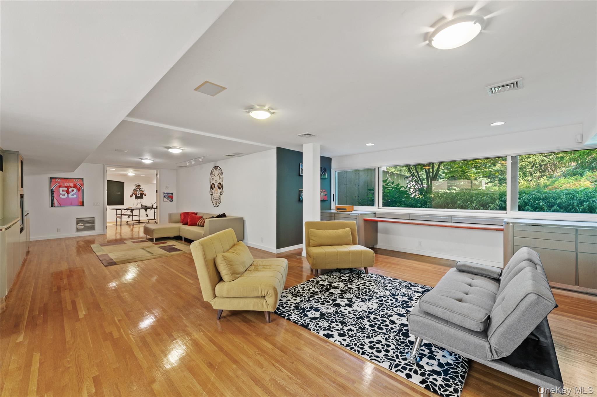 25 Col Sheldon Lane Pound Ridge, NY 10576 - Photo 25 of 34 a living room with furniture and a large window