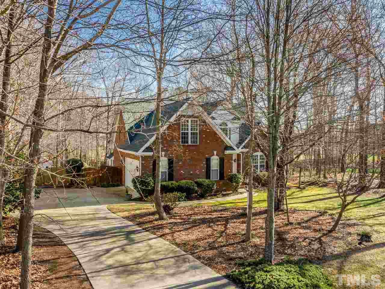 2864 Anfield Road Raleigh, NC 27606 - Photo 2 of 30 Long driveway, nice set back from the street and a two car side load garage.