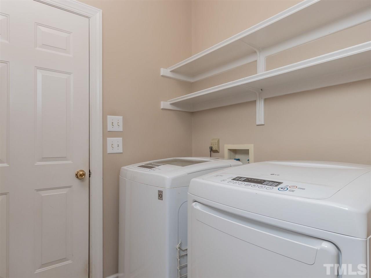 2864 Anfield Road Raleigh, NC 27606 - Photo 23 of 30 Main floor laundry room!