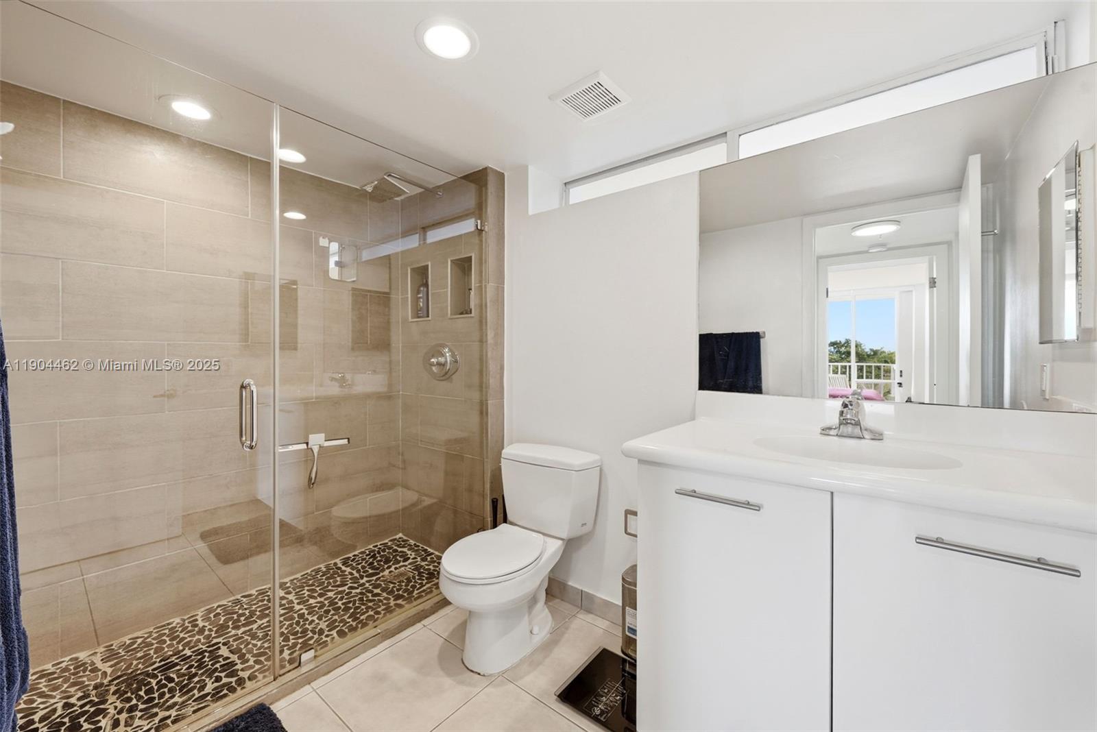 700 Northeast 63rd Street, Unit D607 Miami, FL 33138 - Photo 4 of 29 a bathroom with a sink a toilet and shower