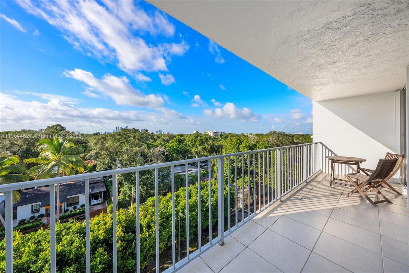 700 Northeast 63rd Street, Unit D607 Miami, FL 33138 - Photo 9 of 29 a view of a balcony with chairs