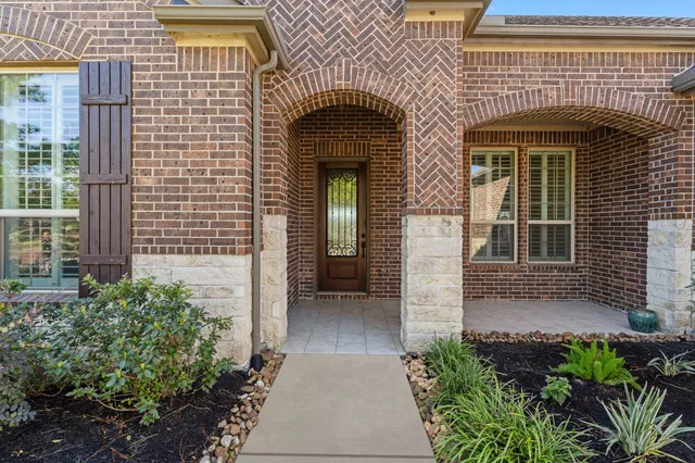 a front view of a house with a porch