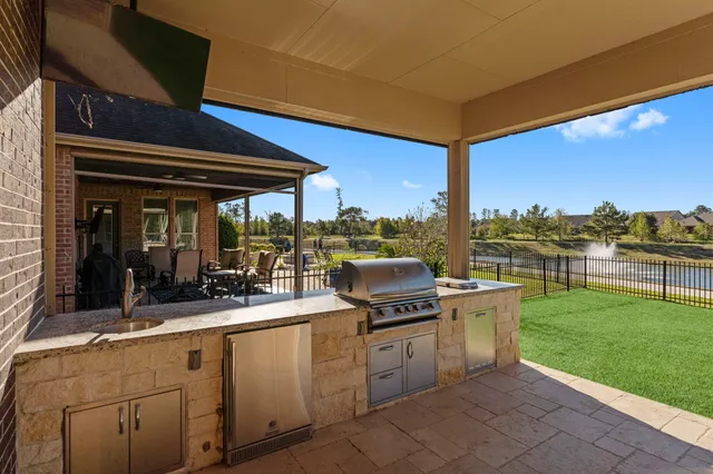 a view of a chairs and table in the terrace