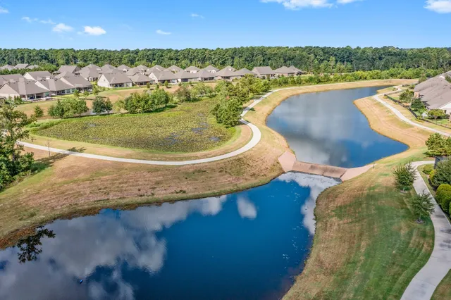 a view of a patio with a table and chairs