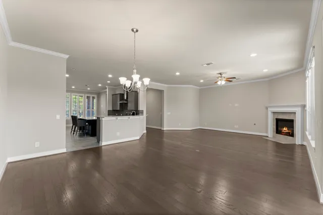 a view of a living room and chandelier