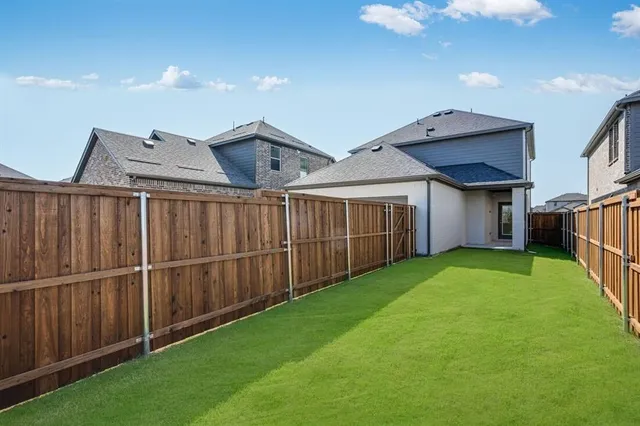a front view of a house with yard