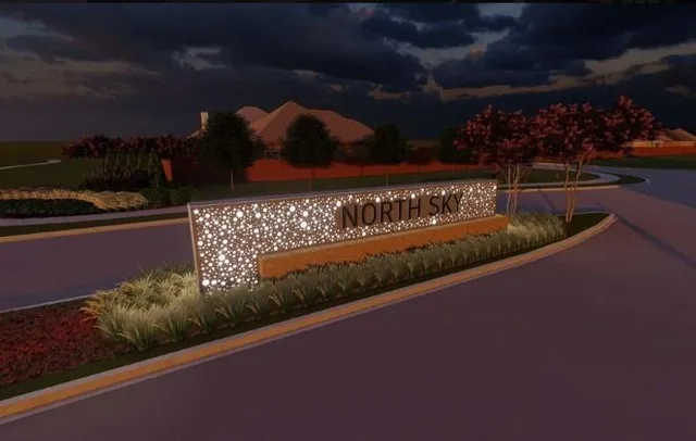 a view of a patio with table and chairs potted plants