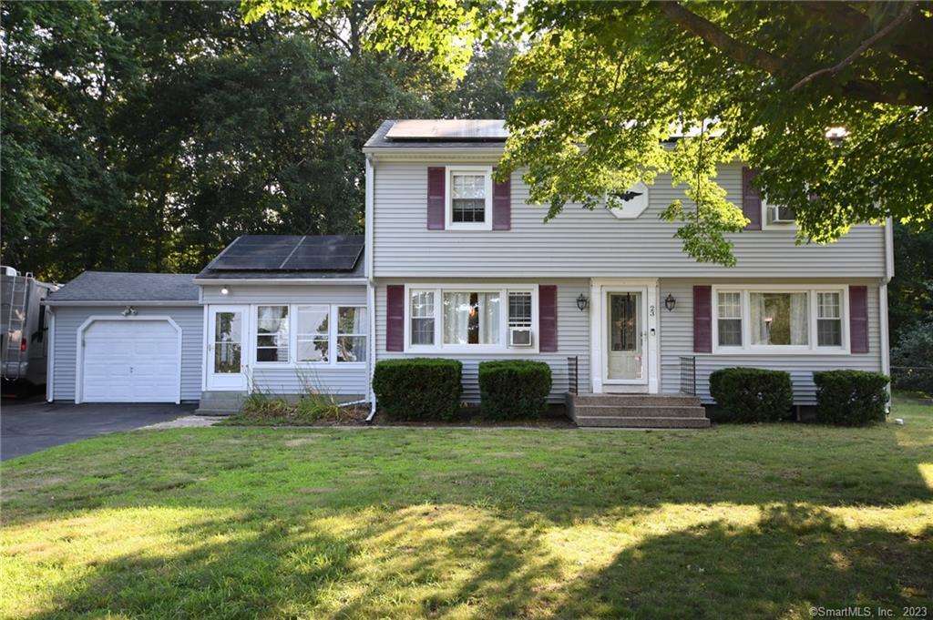 23 Milton Road Waterford, CT 06375 - Photo 1 of 1 a front view of a house with a yard