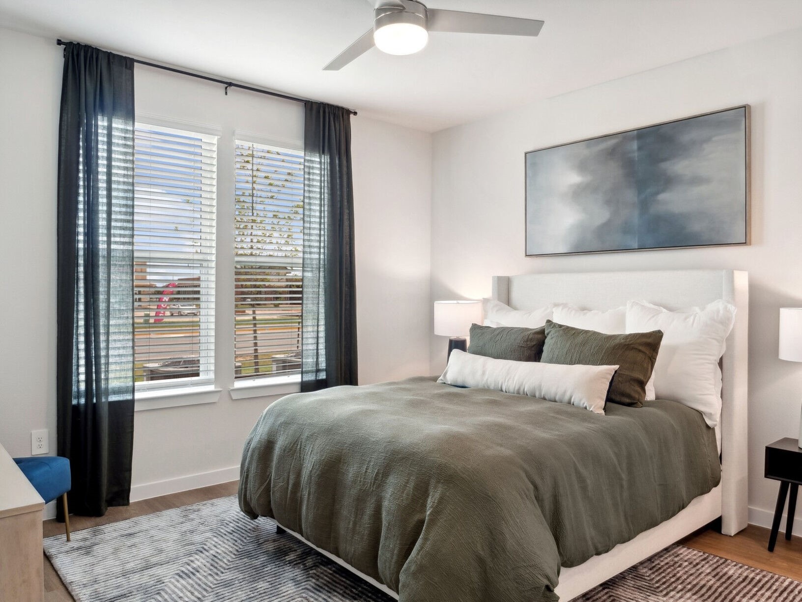 23100 Clay Road, Unit 1209 Katy, TX 77493 - Photo 6 of 29 a bedroom with a large bed and a window