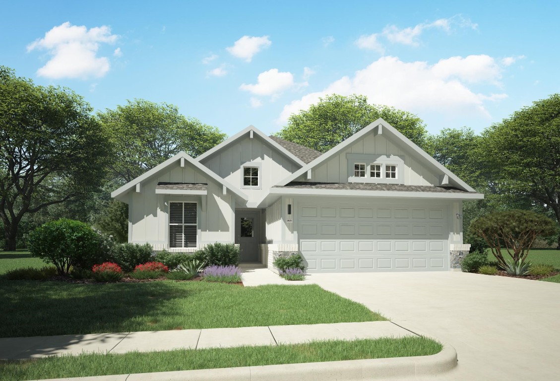 124 Spirit Street Elgin, TX 78621 - Photo 1 of 1 a front view of a house with a yard