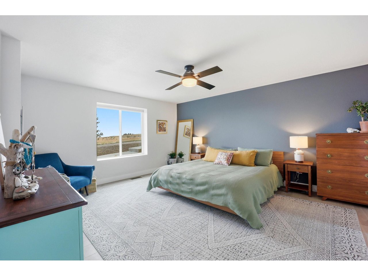 10320 Miners Lake Road Fort Collins, CO 80524 - Photo 16 of 44 Spacious primary bedroom on main level