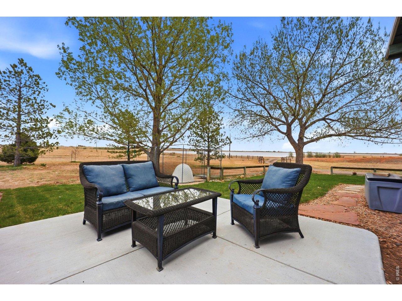 10320 Miners Lake Road Fort Collins, CO 80524 - Photo 36 of 44 Beautiful outdoor sitting area, perfect for enjoying summer evenings in peace