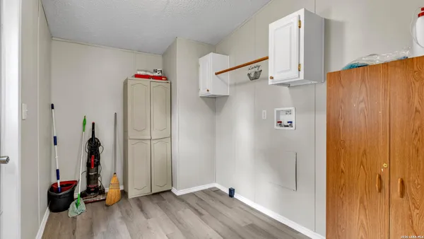 a view of entryway with wooden floor