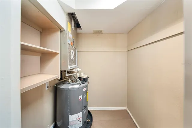 a view of storage and utility room with washer and dryer