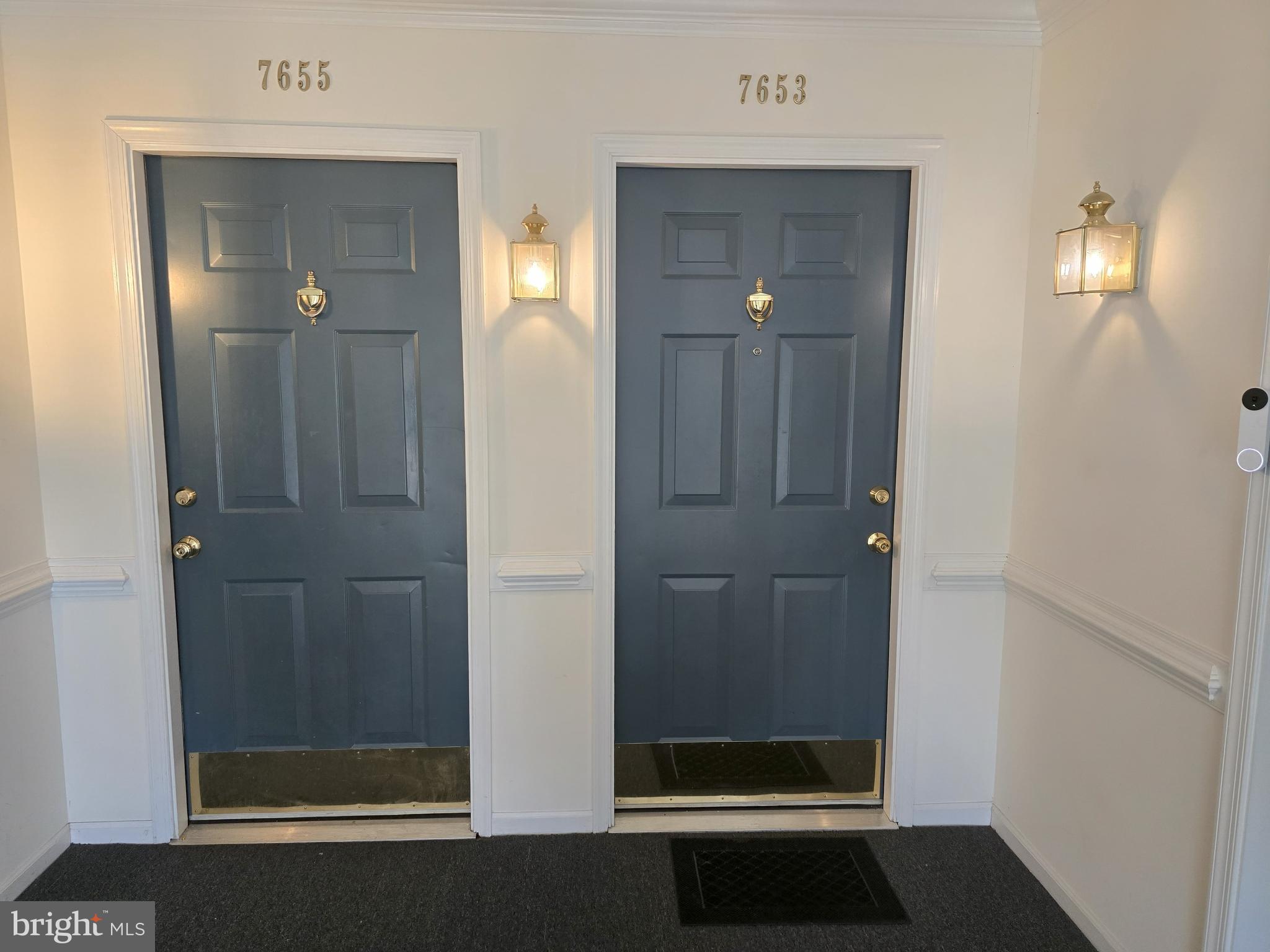 7653 Gladstone Road, Unit 57653 Windsor Mill, MD 21244 - Photo 7 of 16 Two Front Doors on Level Facing Unit