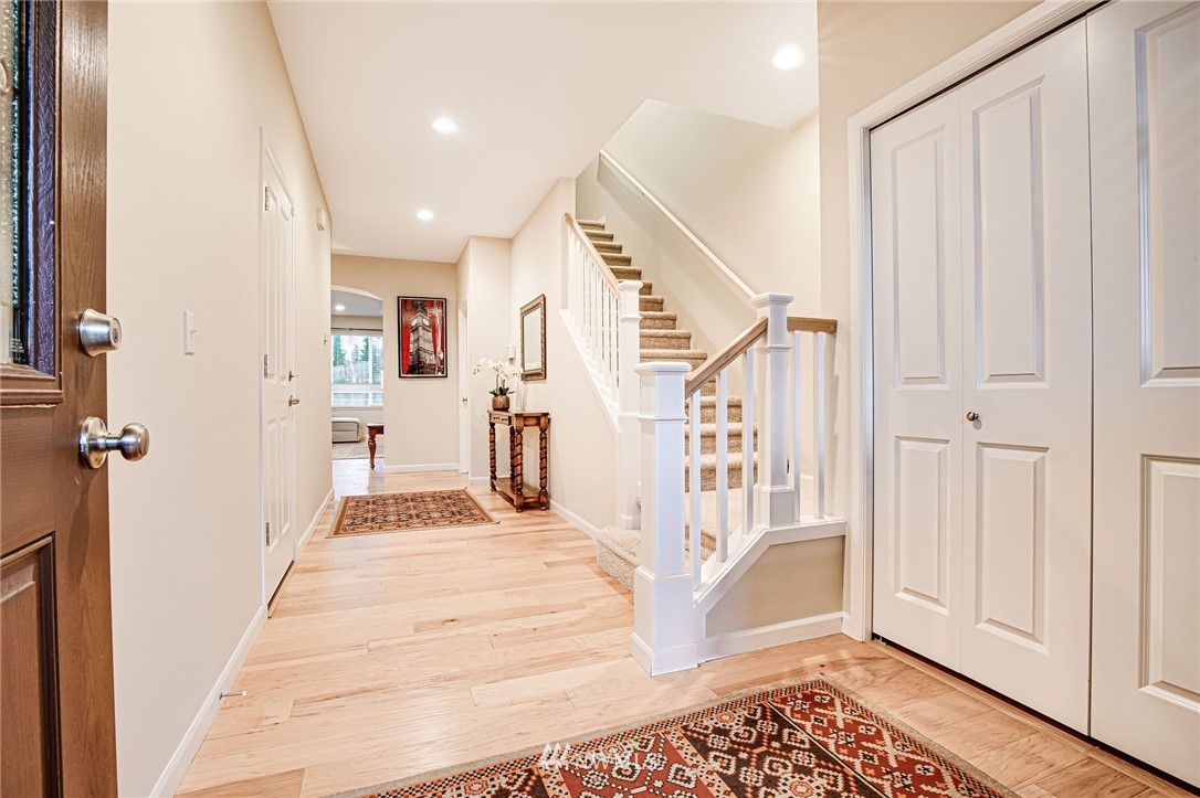 4025 181st Place Southeast Bothell, WA 98012 - Photo 2 of 26 a view of entryway with white walls and rug