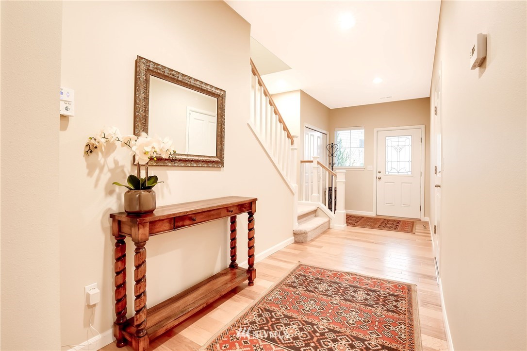 4025 181st Place Southeast Bothell, WA 98012 - Photo 3 of 26 a view of an entryway with wooden floor