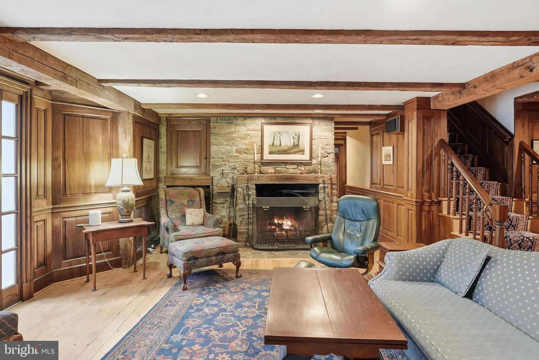11610 Beall Mountain Road Potomac, MD 20854 - Photo 19 of 28 Lower Level Family Room w/ wood burning fireplace