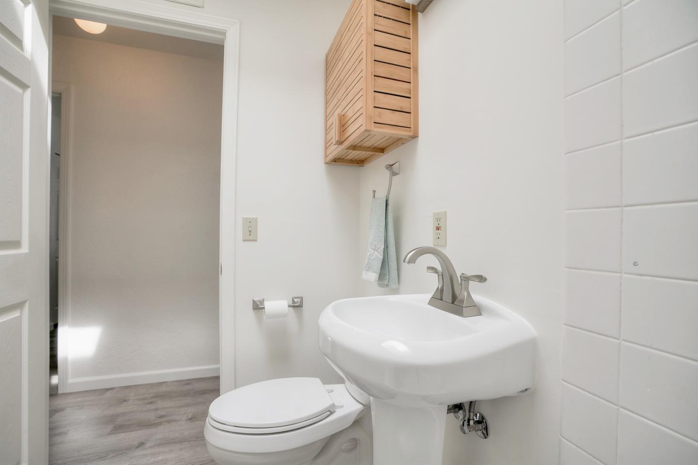 26419 Oliver Road Carmel, CA 93923 - Photo 17 of 35 a bathroom with a sink toilet and a mirror