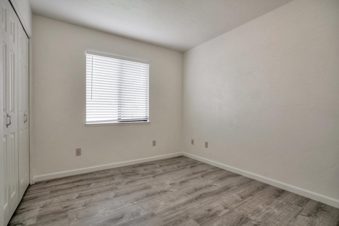 26419 Oliver Road Carmel, CA 93923 - Photo 18 of 35 an empty room with a window
